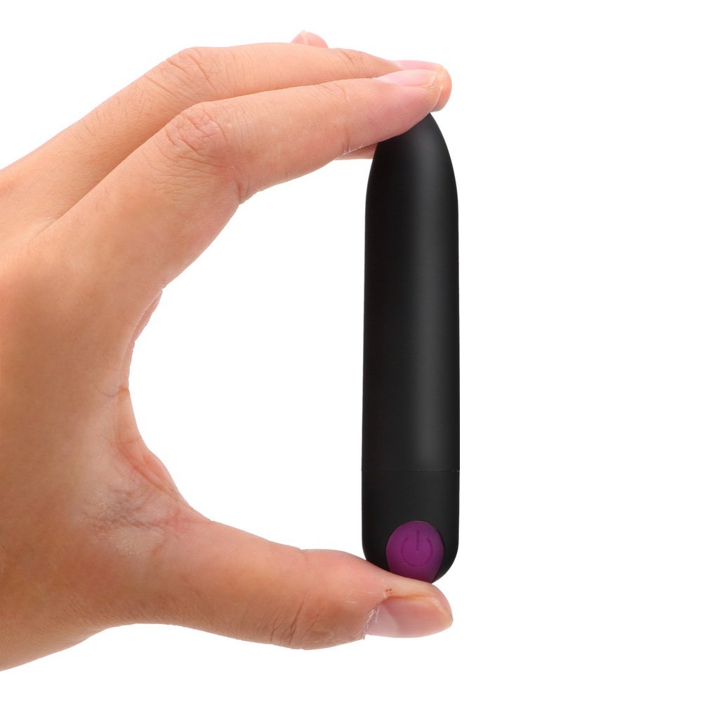 Vibrador Bullet Ogiva Recarreg�vel Preto, em m�o feminina, vista lateral