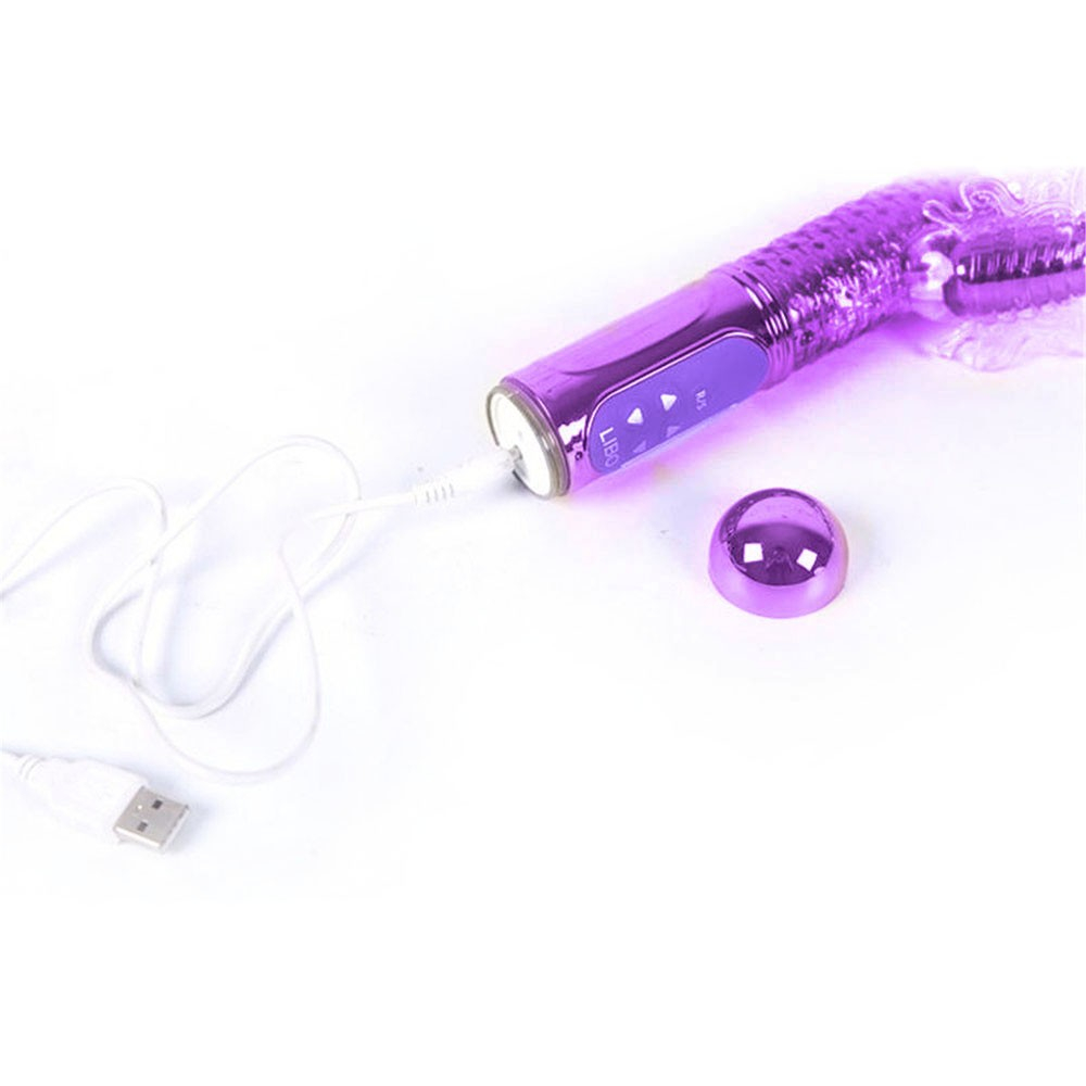 Close-up da ponta do Vibrador Rabbit Rotativo Roxo, destacando detalhes de movimento e vibra��o