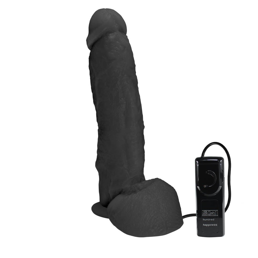 P�nis JeFree em PVC flex�vel, at�xico, com escroto, ventosa e vibrador, 25x6.5cm, preto. Vista em �ngulo do produto.