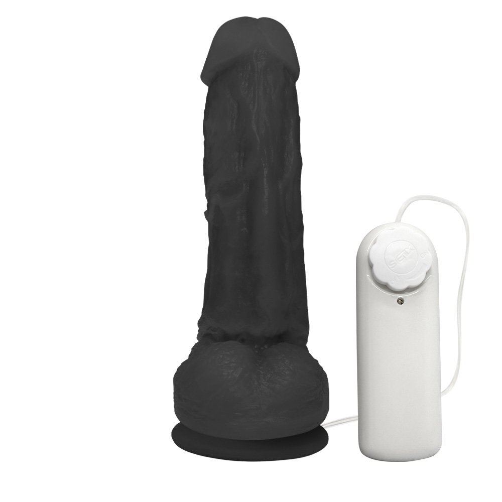 Detalhe do escroto e da base com ventosa do P�nis Real�stico Feito em PVC Flex�vel com Escroto, Vibrador e Ventosa King 19 x 5cm Preto, mostrando a flexibilidade e a textura