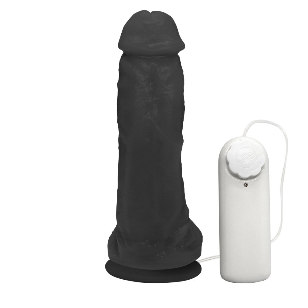 P�nis Real�stico Feito em PVC Flex�vel com Escroto, Vibrador e Ventosa King 19 x 5cm Preto em posi��o vertical, real�ando a ventosa de fixa��o na base