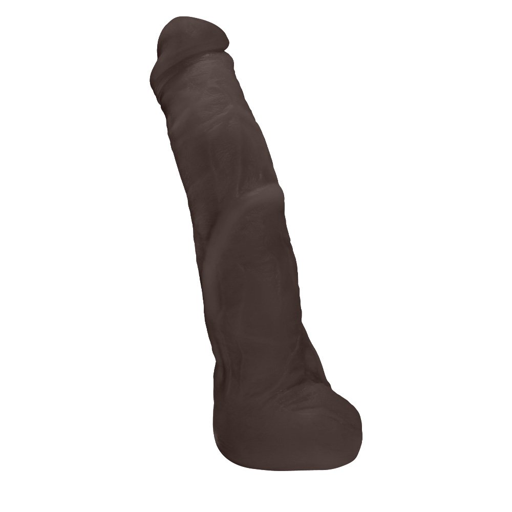 vista lateral do P�nis Gigante e Grosso Flex�vel com Escroto Mandingo 27 x 5,5cm Marrom evidenciando espessura generosa, curvatura e propor��o imponente do produto