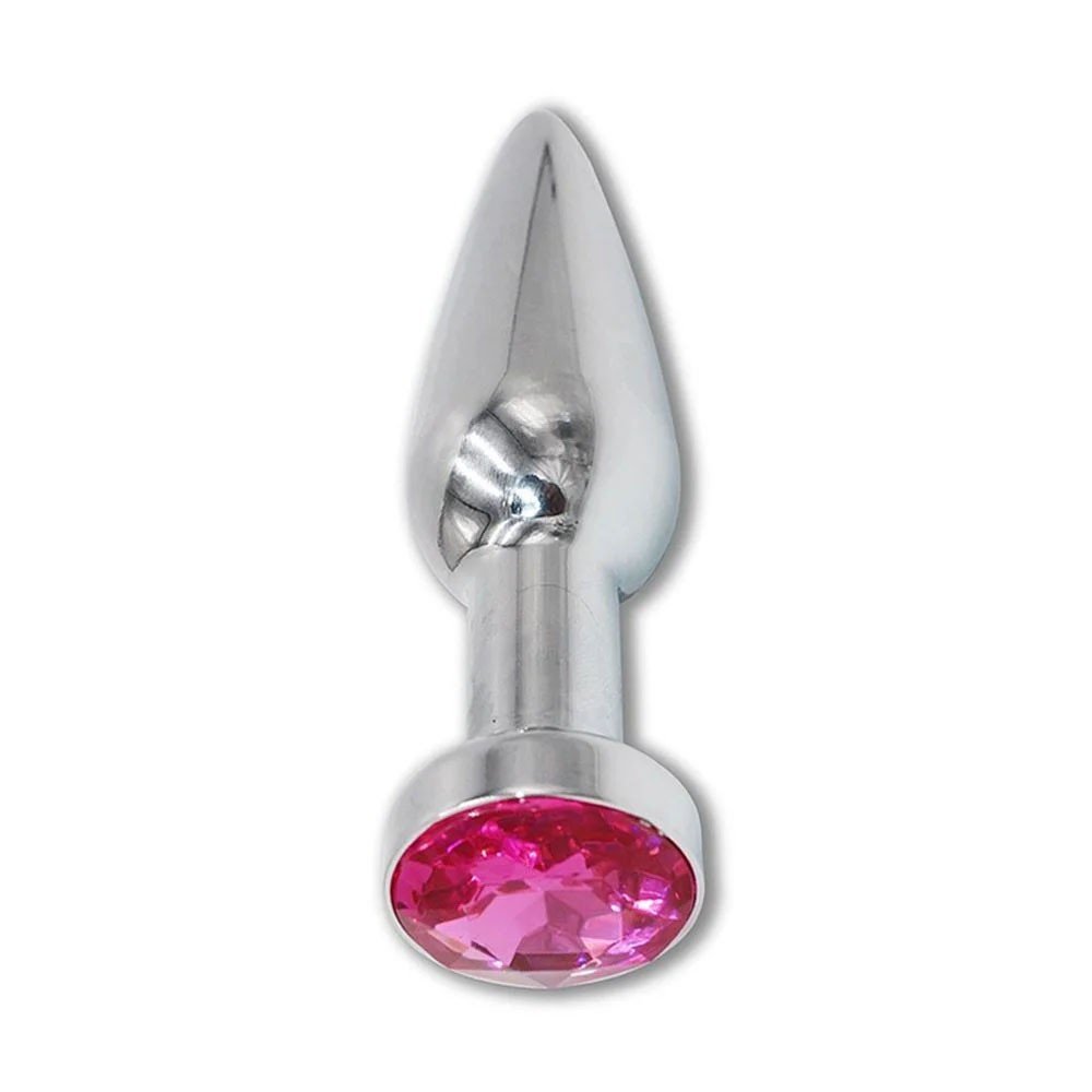 imagem ambientada do plug anal joia em a�o inox com cristal pink destacando eleg�ncia e impacto visual