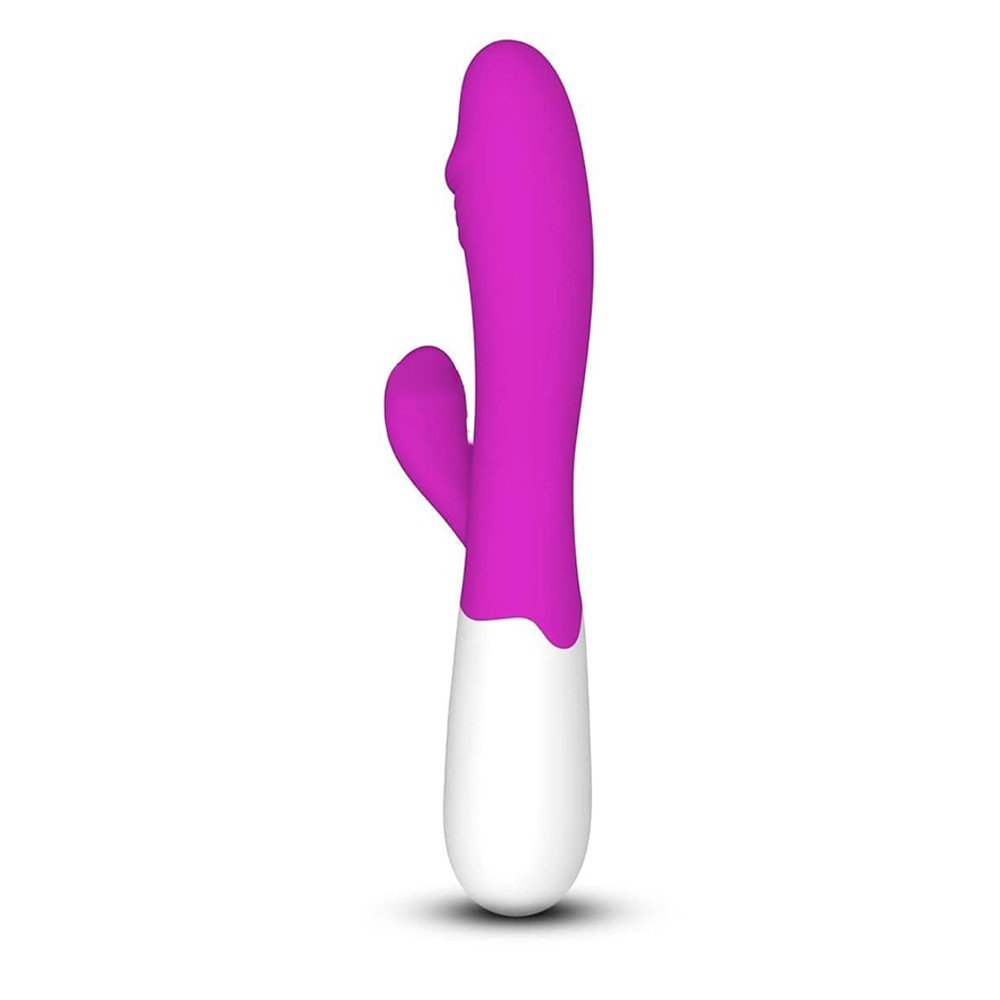 Vibrador Duplo Sime 2 Pink, em ambiente relaxante, com foco no design e cor pink vibrante.