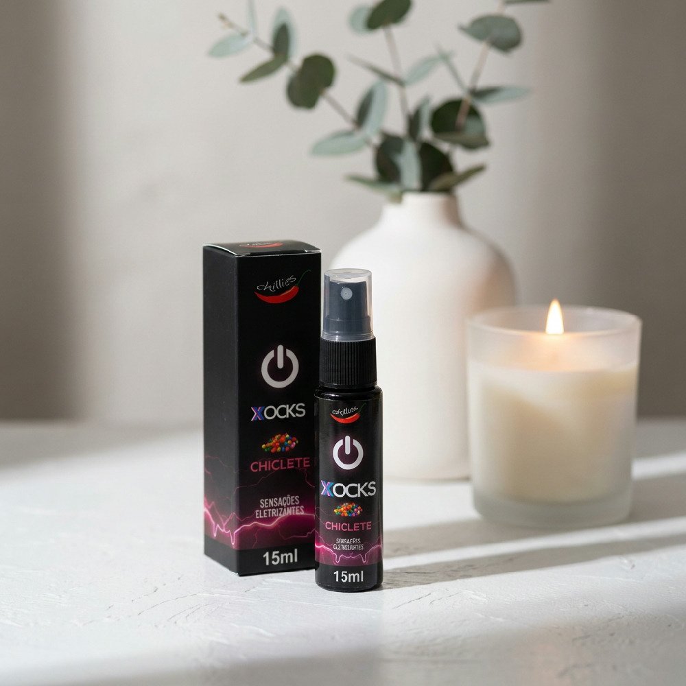 Vibrador L�quido Aroma Chiclete Xocks 15ml | Frasco e embalagem em �ngulo, evidenciando o design moderno e o sabor de chiclete.