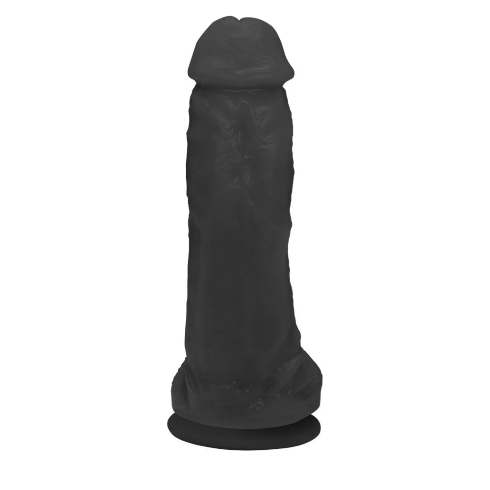 Close da textura do P�nis Real�stico Feito em PVC Flex�vel com Escroto e Ventosa King 19 x 5cm Preto, mostrando o material macio e o toque suave do PVC