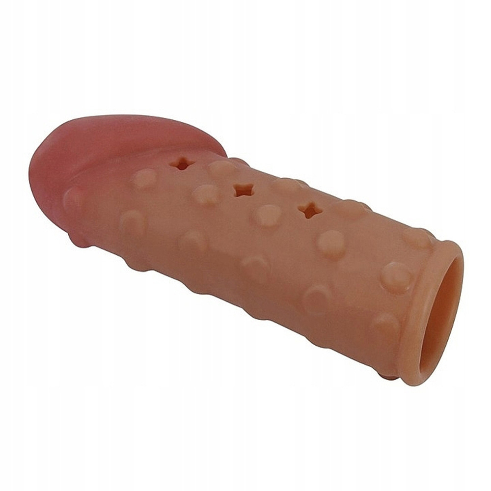 Capa Peniana Vazada em Jelly Macia e Flex�vel 10 x 2,8cm Bege vista em �ngulo lateral, evidenciando a textura e o design vazado