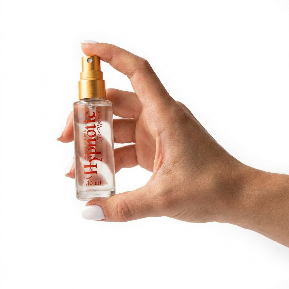 M�o de mulher segurando frasco de Perfume Afrodis�aco Hypnotic de 30ml, mostrando o tamanho compacto