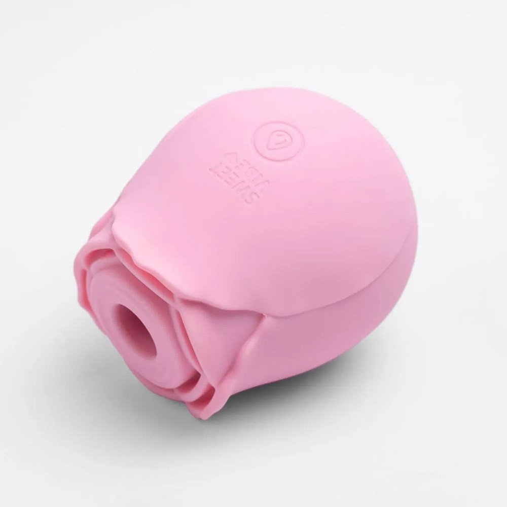 Vista da parte inferior do Vibrador para Clit�ris Fl� Rosa, mostrando a porta de carregamento magn�tica.
