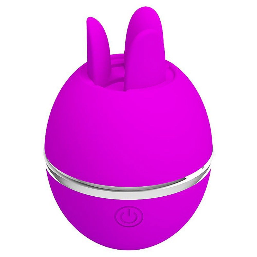 Vibrador Gemini Ball Pink na m�o de uma pessoa, mostrando o tamanho compacto e ergonomicidade