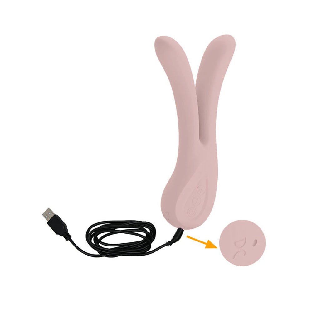 Vibrador Duplo Ulysses em �ngulo que revela a textura macia do silicone e o ponto de carregamento USB