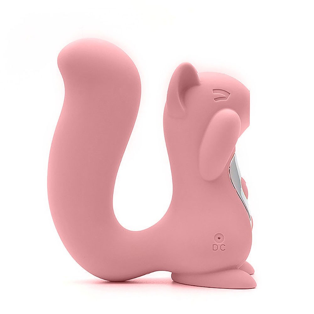 Vibrador para Clit�ris Miss UU Rosa, vista lateral. Cauda curva que funciona como al�a e entrada USB para carregamento
