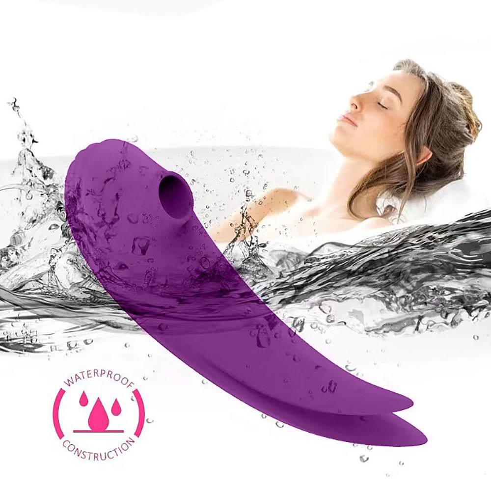 Vibrador para Clit�ris em Silicone Recarreg�vel Roxo - Imagem do vibrador em um �ngulo que destaca o material de silicone e as linhas fluidas do design.