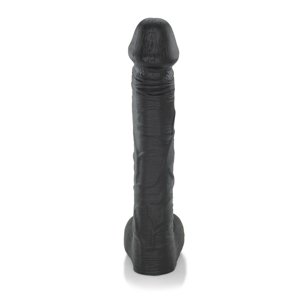 P�nis Real�stico em PVC Flex�vel Cabe��o 31 x 6cm Preto em vista lateral, ressaltando o formato anat�mico e o escroto na base