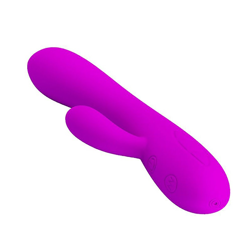 Vibrador Duplo Victor Pink, vista diagonal mostrando a textura aveludada do silicone e o ponto de carregamento magn�tico