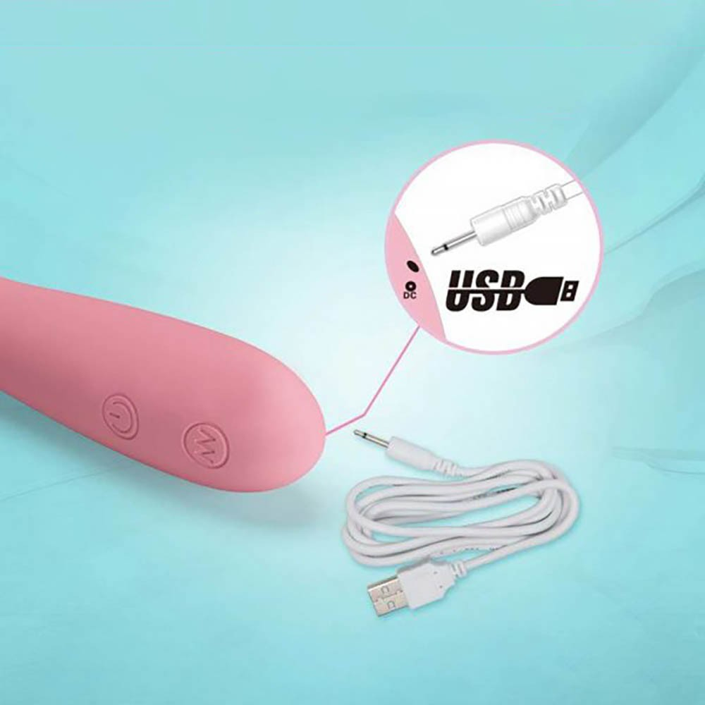 Vibrador Grace Rosa posicionado horizontalmente, mostrando a curvatura e flexibilidade do corpo em silicone