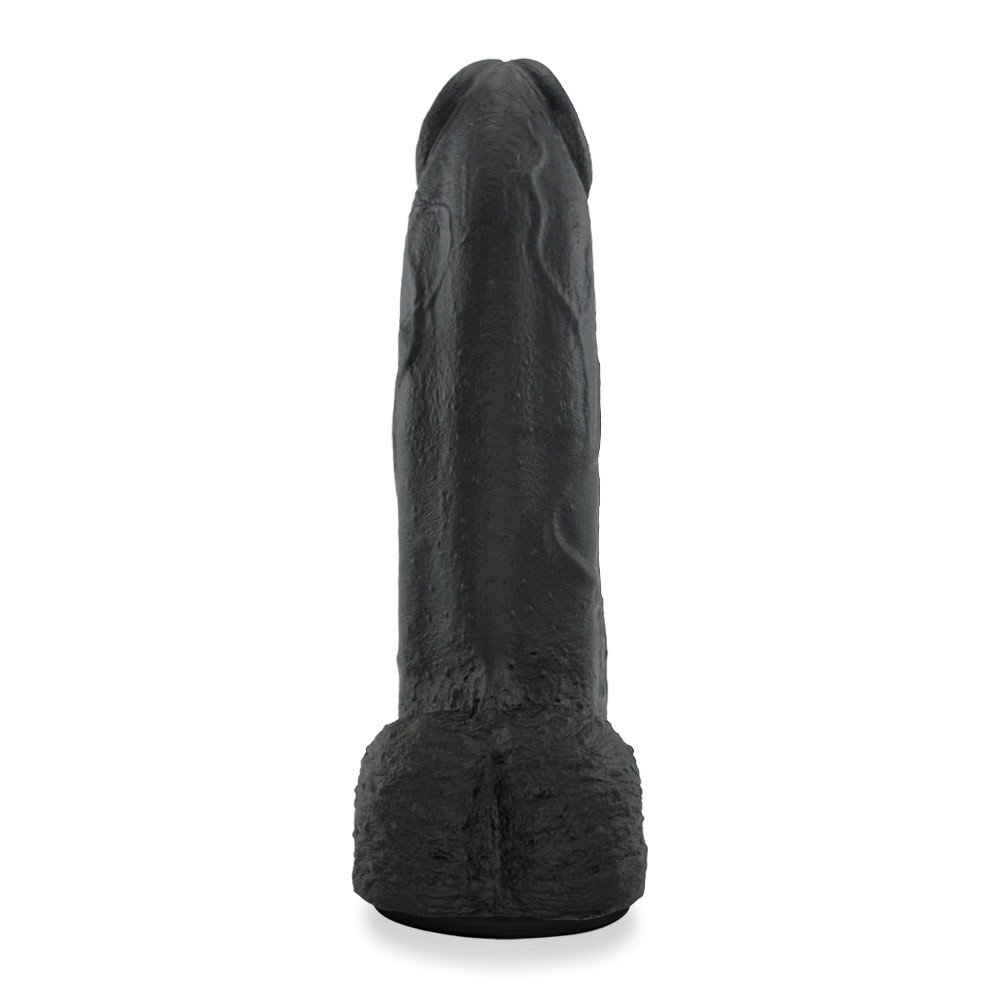 Vista lateral do P�nis Real�stico em PVC Flex�vel com Ventosa Moz�o com detalhes de veias, seu formato anat�mico e a ventosa na base.