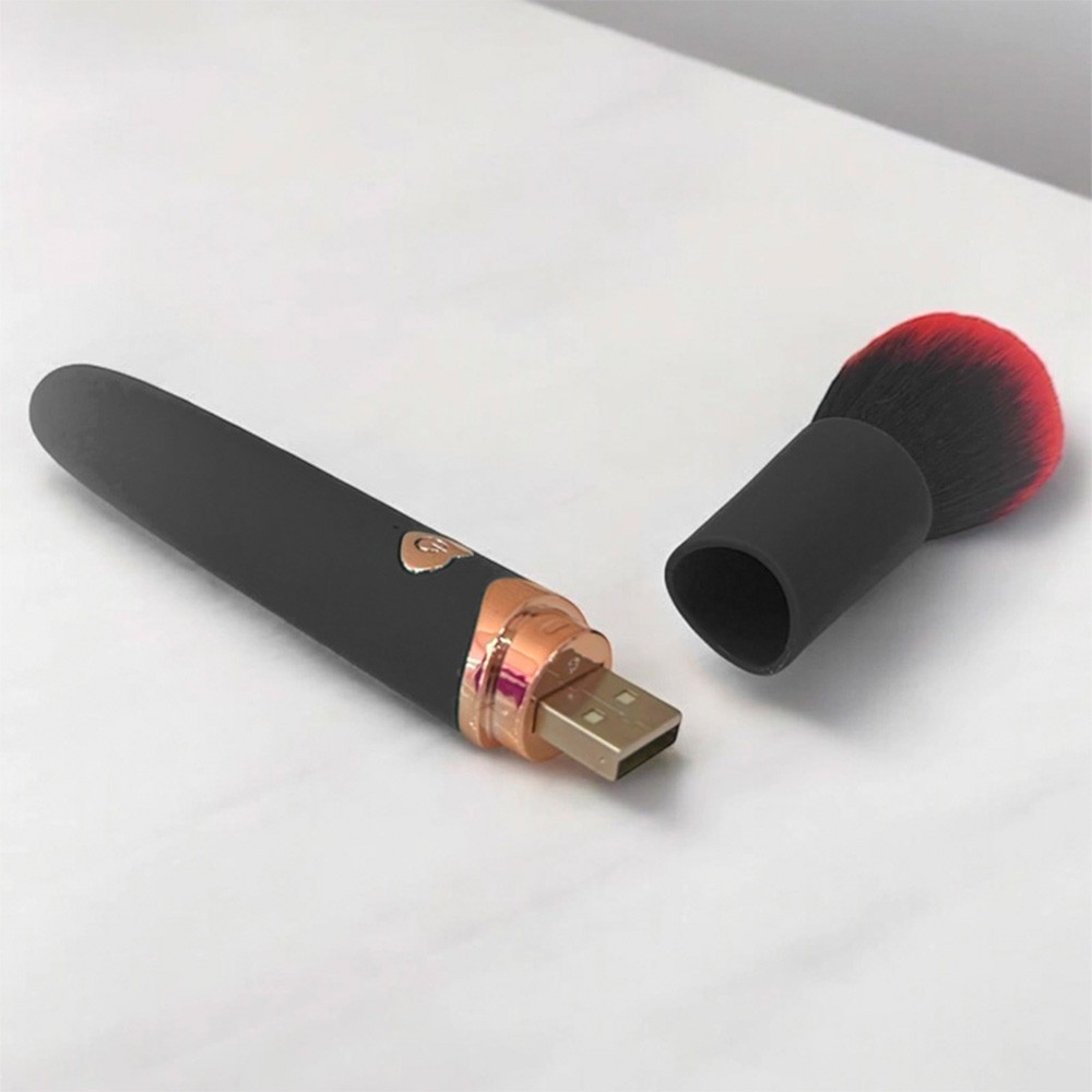 Vibrador Discreto Recarreg�vel em Silicone Pincel de Maquiagem Roxo - tampa removida revelando conector USB