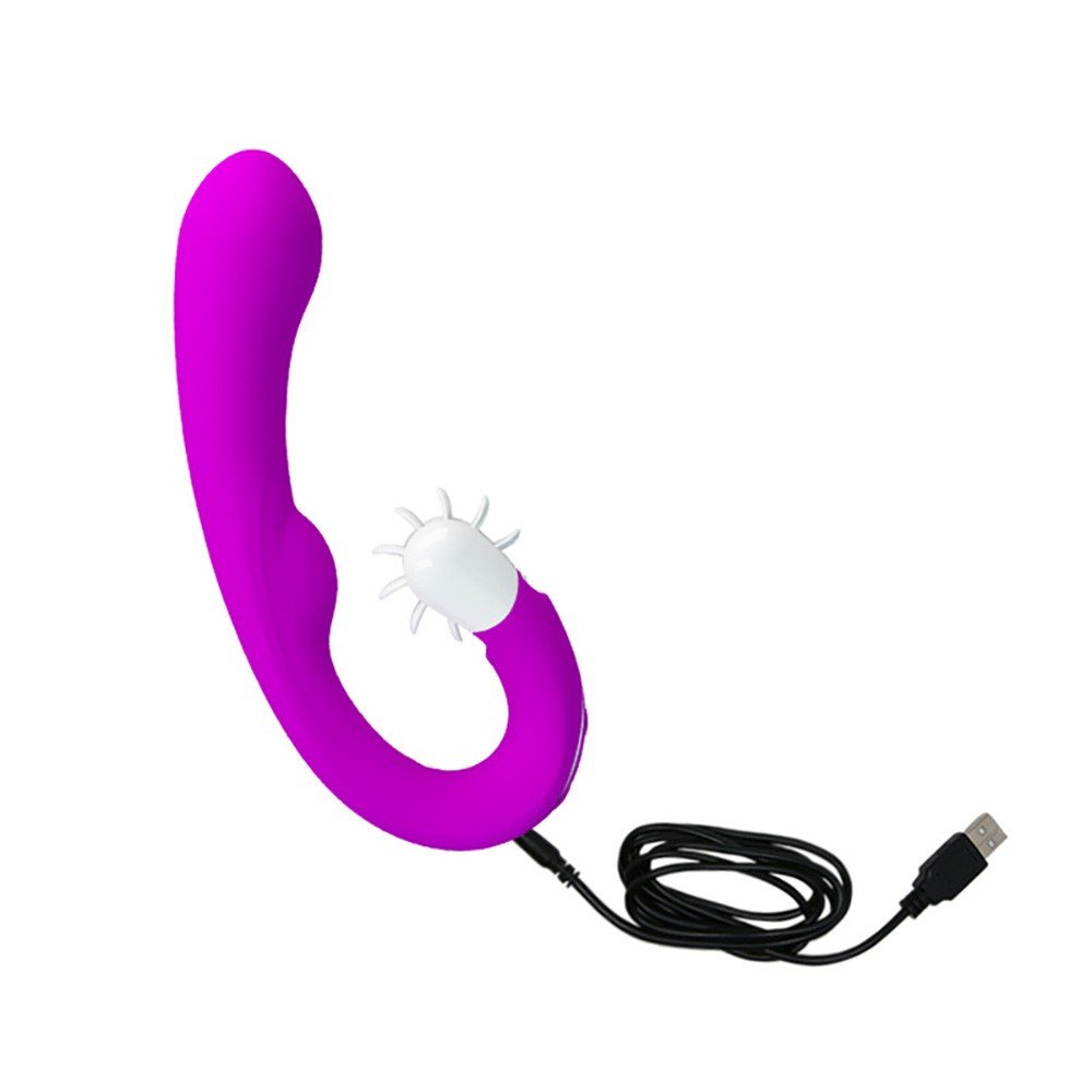 Vibrador Duplo Magic Tongue Pink deitado, evidenciando o comprimento e a curvatura ergon�mica