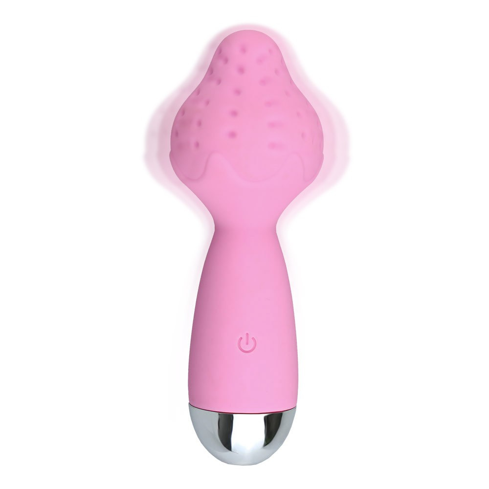 Massageador Er�tico Morango Rosa em a��o, com o morango vibrando e as sementes em relevo proporcionando est�mulos sensuais