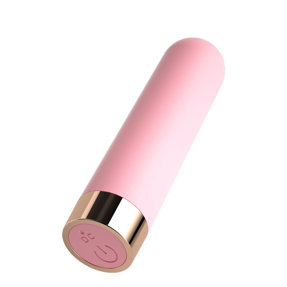 Vibrador Bullet Recarreg�vel Mily Rosa em vista inclinada mostrando a base dourada com bot�es de recarga DC e liga/desliga