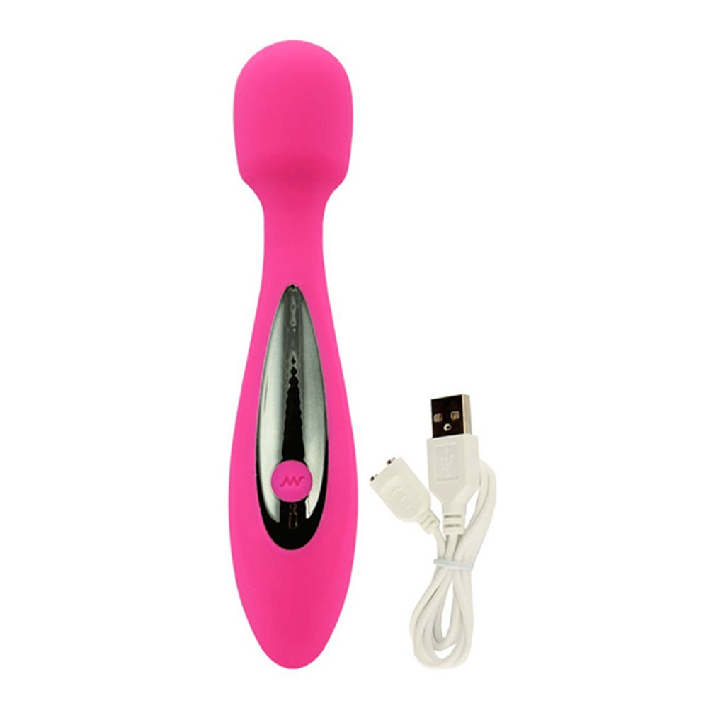 Vibrador er�tico Sex Massager Pink ao lado de seu cabo de carregamento USB
