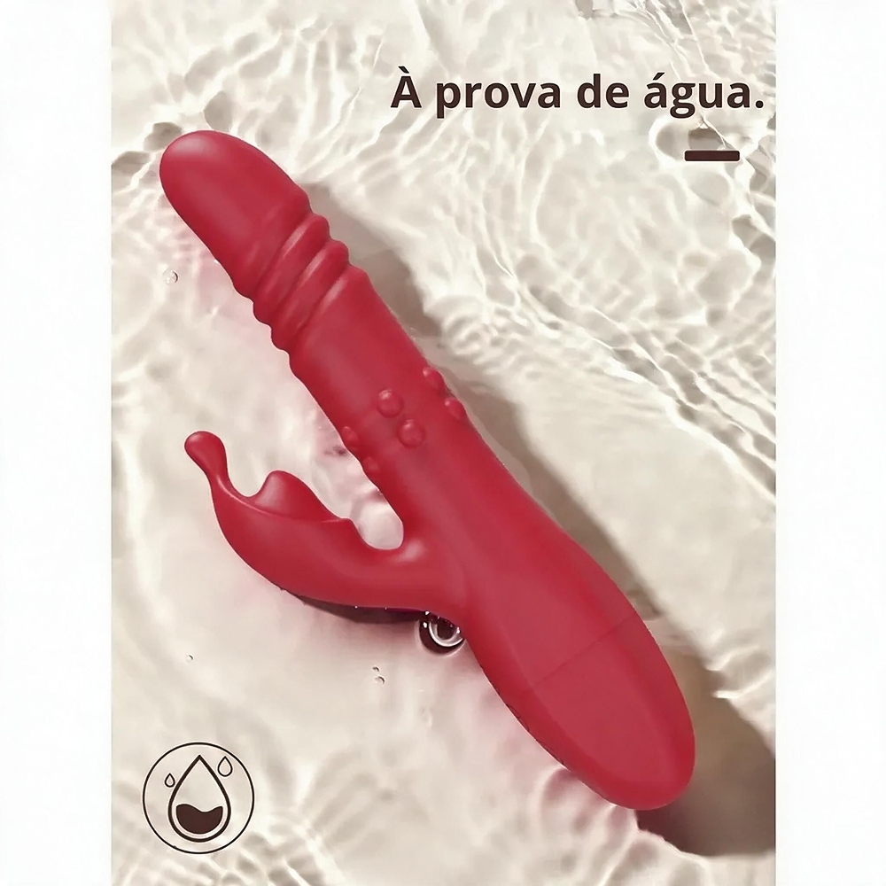 Vibrador duplo de silicone em vermelho sobre superficie molhada com texto 'A prova d'agua' e icone de gotas