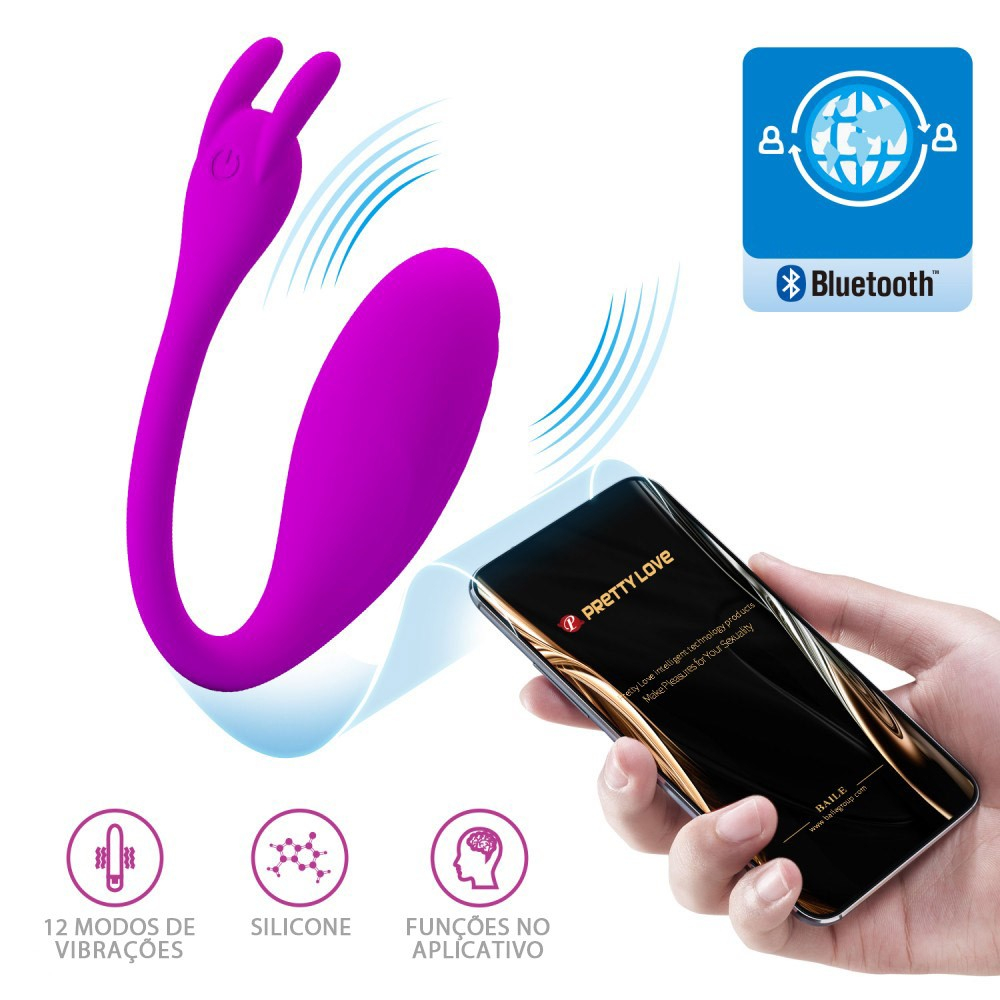 Vibrador para Casal Catalina Pink, vista com celular demonstrando controle via APP e 12 modos de vibra��o.