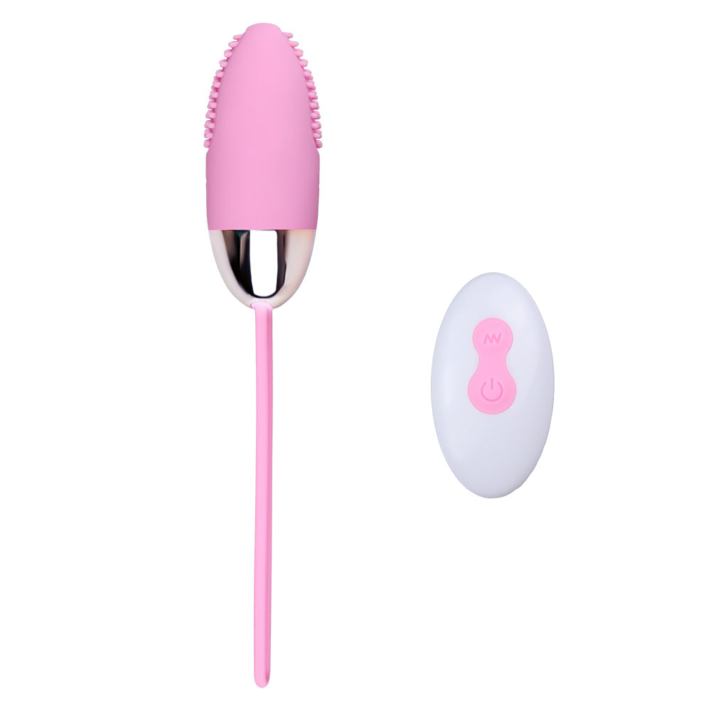 Vibrador Bullet Recarreg�vel em Silicone Rosa e seu controle sem fio branco com bot�es rosa