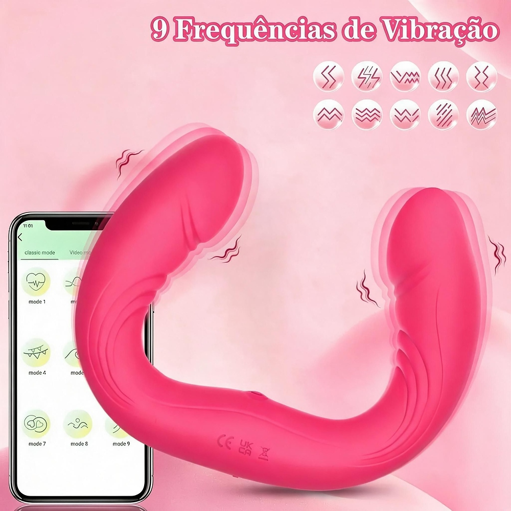 Vibrador duplo em silicone pink em formato de U, com setas indicando a vibra��o e o texto '9 Frequ�ncias de Vibra��o', exibindo �cones dos modos no topo da imagem