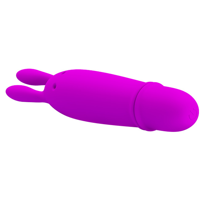 Vibrador para Clit�ris em Formato de Coelho Roxo deitado, mostrando as orelhas