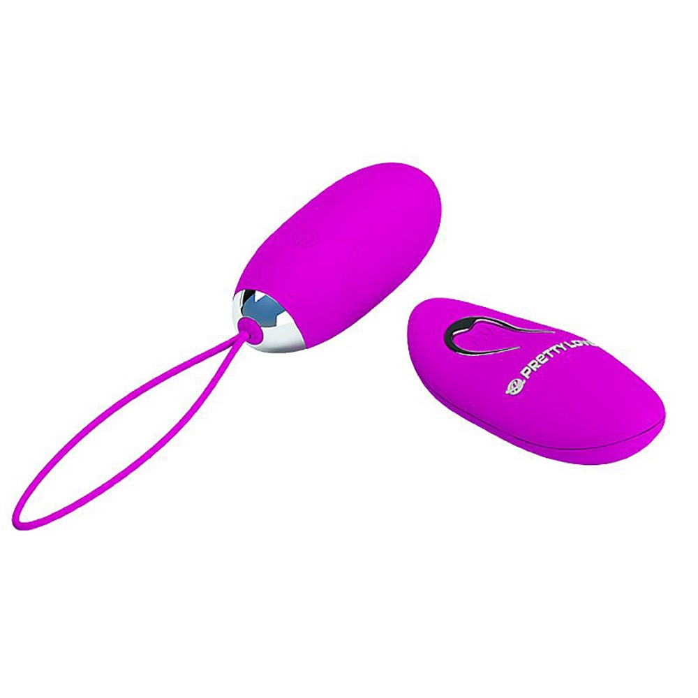 Vibrador Bullet Jenny Pink e controle sem fio com al�a de pulso em detalhe