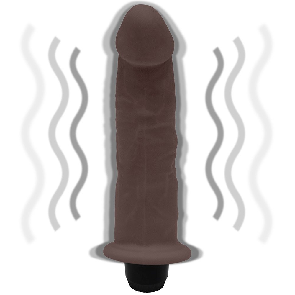 p�nis real�stico vibrador em composi��o completa destacando tamanho, propor��o e design do acess�rio �ntimo