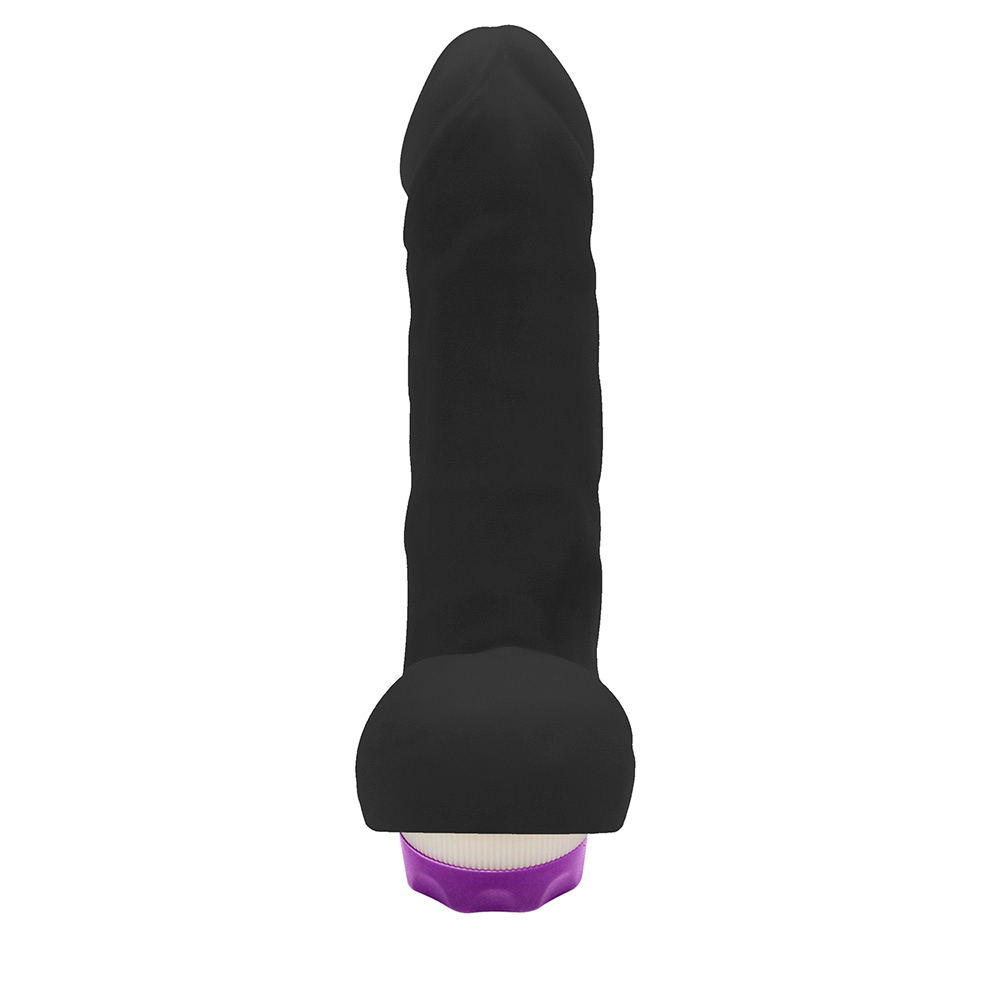 P�nis com Escroto e Vibro Hefesto 17 x 4cm Preto em vista frontal, mostrando a largura de 4cm e a base roxa com o anel branco que indica o mecanismo de vibra��o.