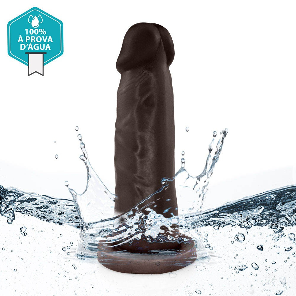P�nis de Borracha Mimo Marrom em close-up, destacando a superf�cie lisa e a cor marrom do produto