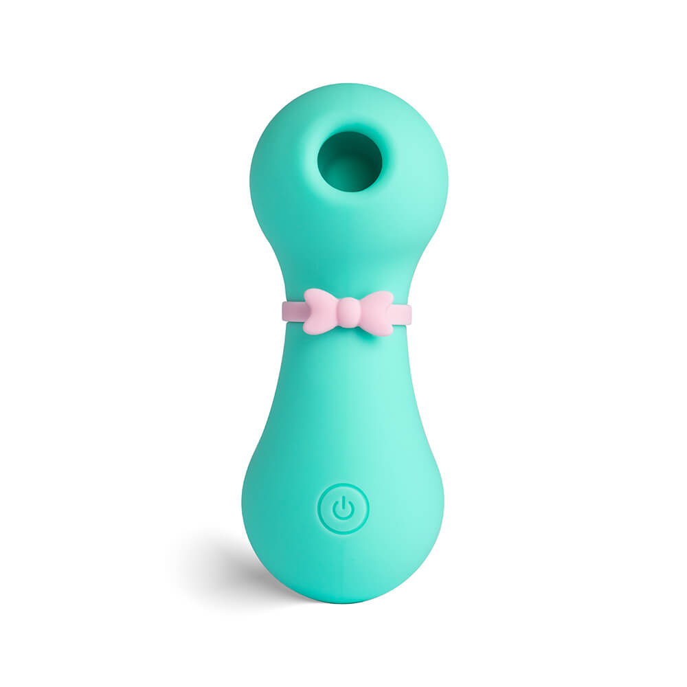 Vibrador Jack Cyan em silicone, cor ciano, com um la�o decorativo rosa. Vista frontal.