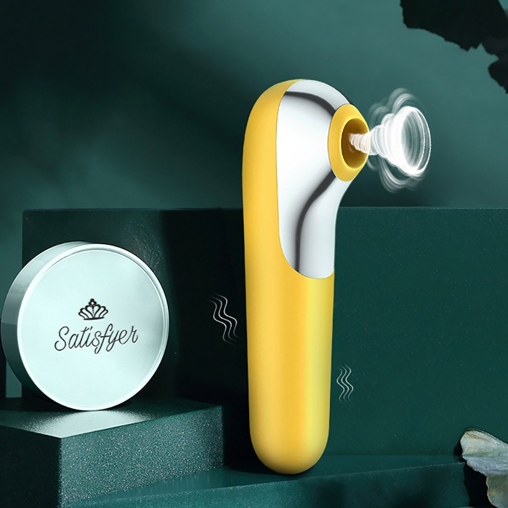 Vibrador Dual Love Amarelo em uso, mostrando a pulsa��o de ar e o design moderno