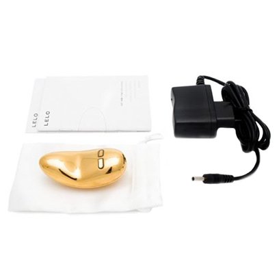Vibrador para Clit�ris Yva em Ouro 18 Quilates - conte�do da embalagem com carregador e manual Lelo