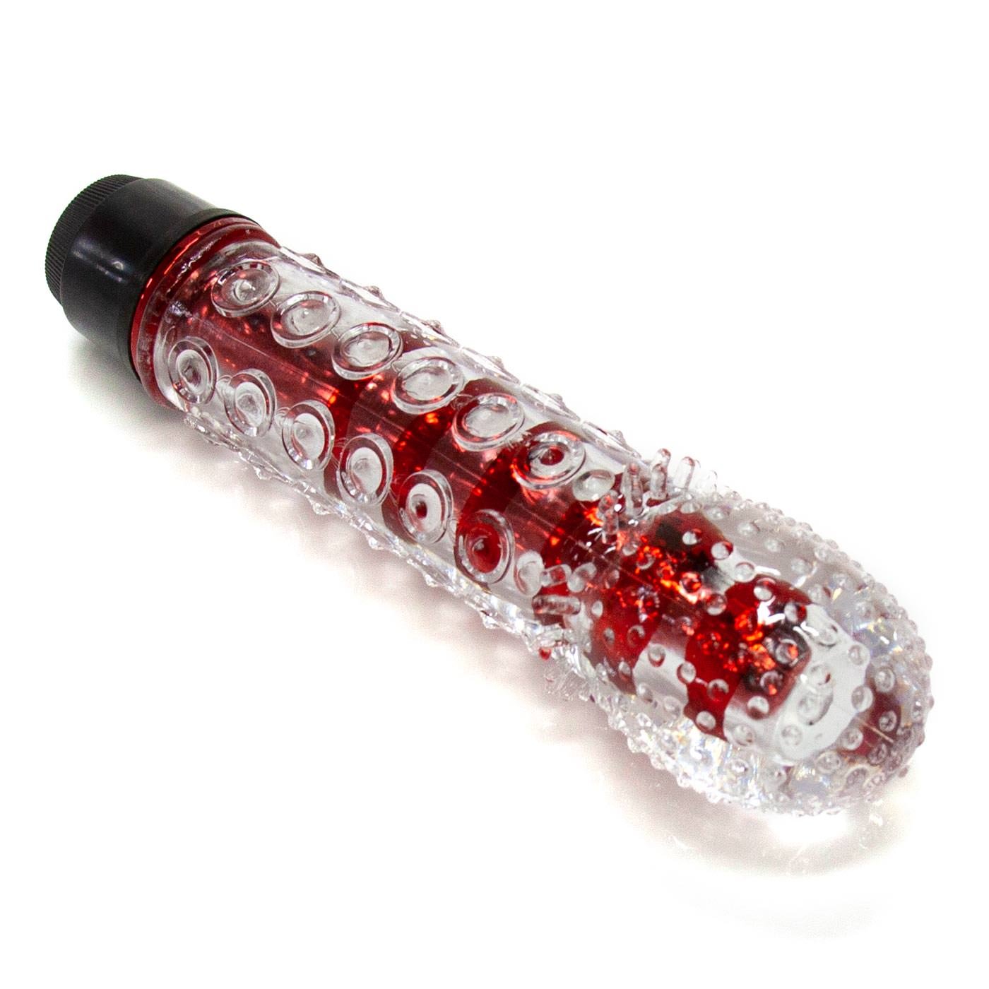 Vista lateral do Vibrador Feminino Multivelocidade com Capa Texturizada, detalhando a ergonomia e o design estimulante da capa exterior transparente e o vibrador vermelho.