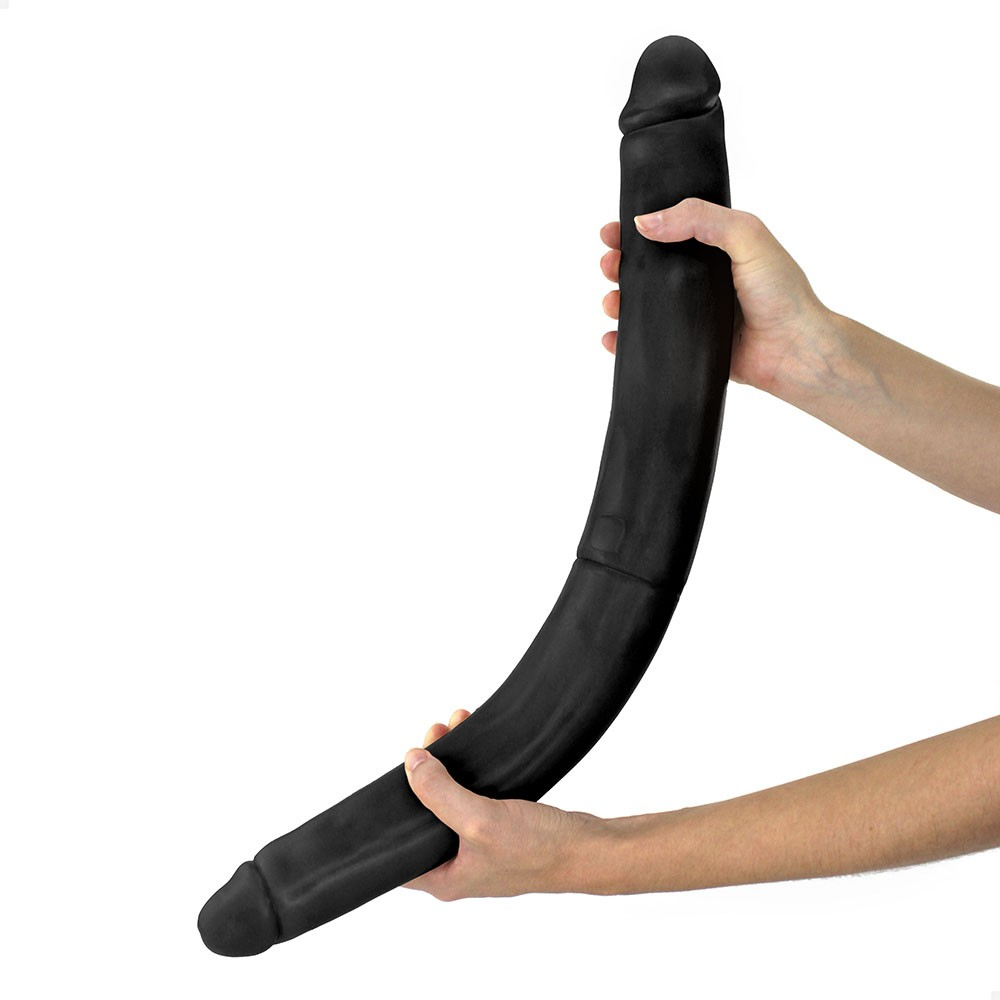 vista lateral do p�nis real�stico vibrador evidenciando espessura, curvatura e propor��o do produto