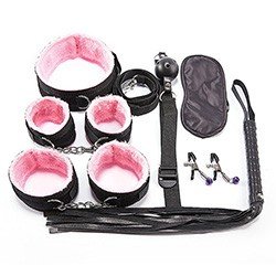 Foto do Produto Kit Bondage 7: Algema, Tornozeleira, Venda, Flogger, Morda�a, Prendedor de Mamilo, Coleira Rosa