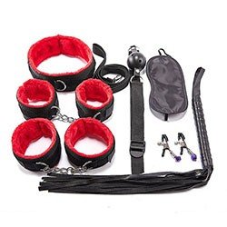 Foto do Produto Kit Bondage 7: Algema, Tornozeleira, Venda, Flogger, Morda�a, Prendedor de Mamilo, Coleira Vermelho